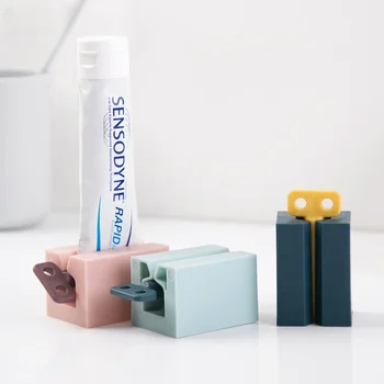 1PC הביתה פלסטיק משחת שיניים מסחטת קל מכונת גלגול בעל אספקת השירותים שן ניקוי אביזרים קרם שיניים